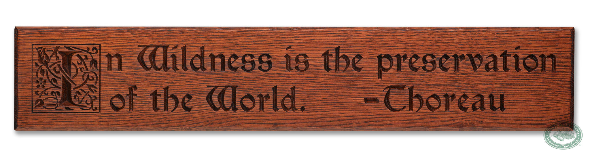 “In Wildness is the preservation of the World.” from Henry David Thoreau is a beautifully carved Wisdom In Wood® inspirational wall art quote (Classic Oak finish)