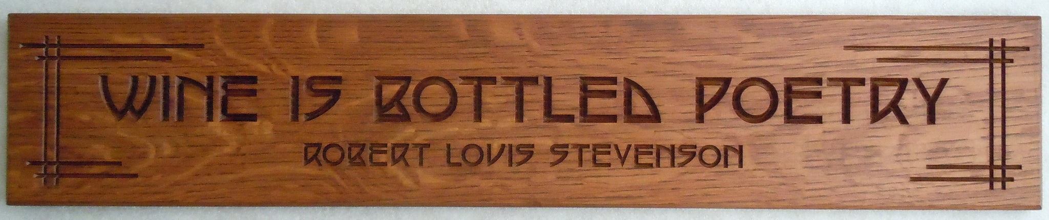 Robert Louis Stevenson - Wine is Bottled Poetry Carving in Classic Oak Finish