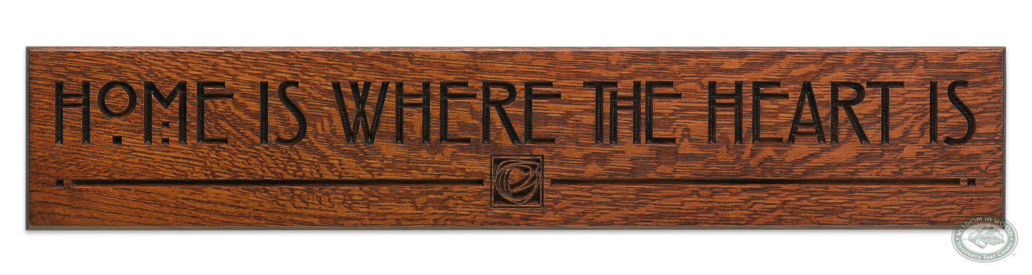 "Home is Where the Heart Is" quote beautifully carved as a Wisdom In Wood® inspirational wall art saying.- Heritage Oak Finish