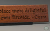 Marcus Tullius Cicero Quote: “There is no place more delightful than one's own fireside.” beautifully carved as a Wisdom In Wood® inspirational wall art saying.- Classic Oak Finish