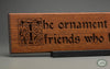 Ralph Waldo Emerson Quote: “The ornament of a house is the friends who frequent it.” beautifully carved as a Wisdom In Wood® inspirational wall art saying.- Classic Oak Finish